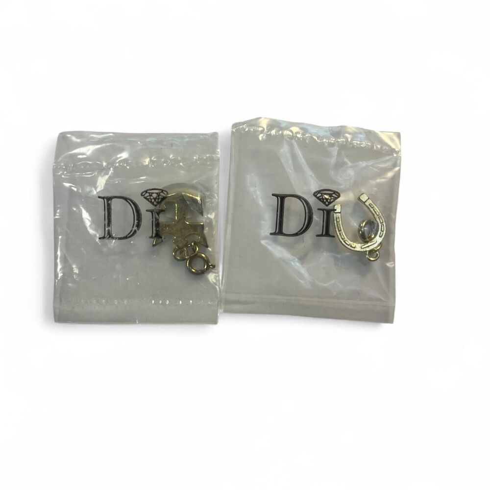 Diamond International Gold Tone Charm Lot of 2 Horseshoe & Cruise Ship Logo